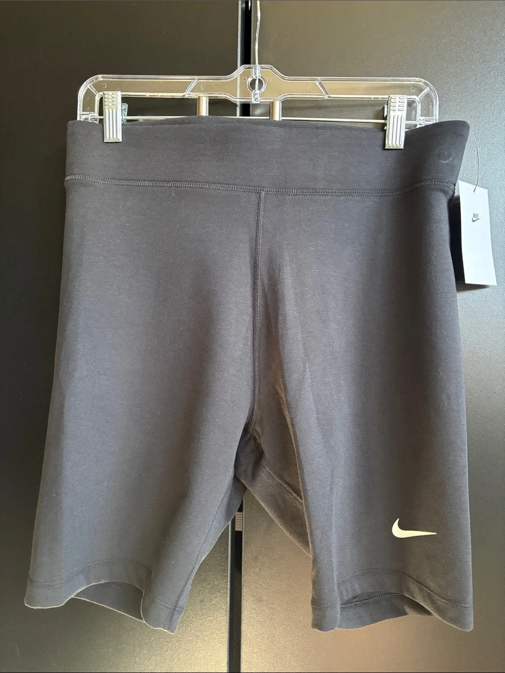 Nike Tight Fit High Rise  8” inseam,stretch shorts, screen print logo, bike